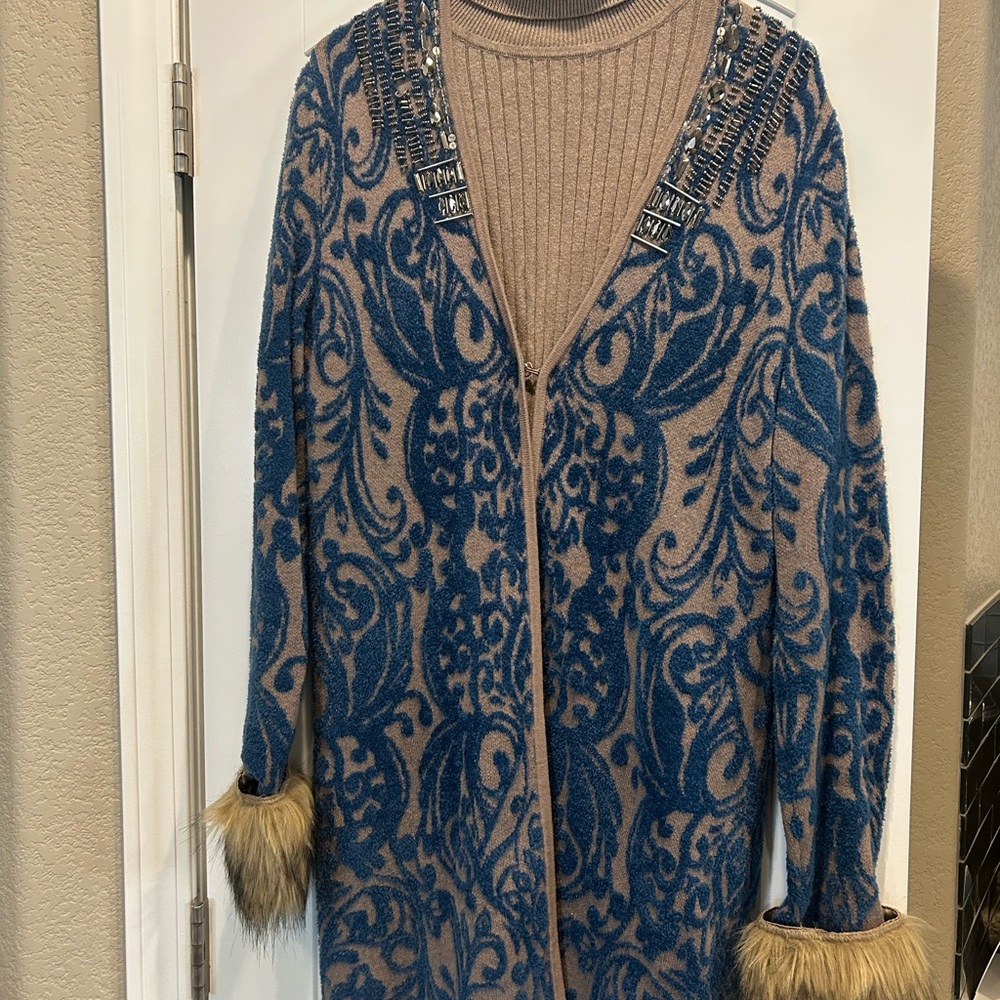 Blue and Tan Patterned Women's Sweater 
Got to go at the lowered price!!!